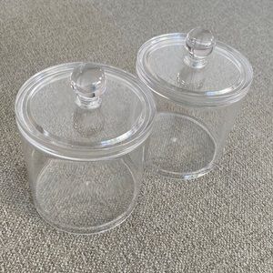 Set of 2 clear acrylic round storage box with lid. Used in good condition.